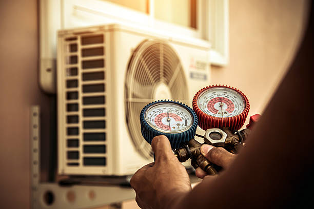 Professional Air Conditioning Service technician working in Gretna, FL